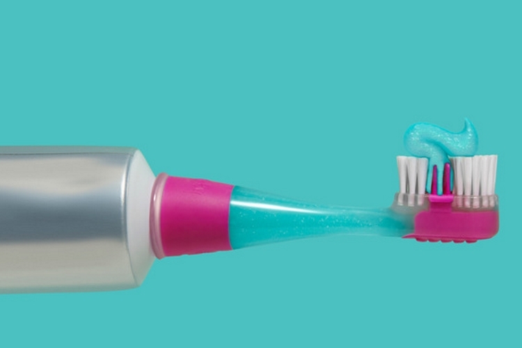 toothbrush with toothpaste built in
